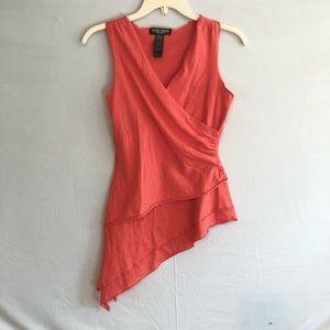 Orange asymmetrical top